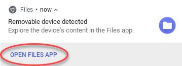 Screenshot of the 'Removable device detected' message with 'Open files app' circled.